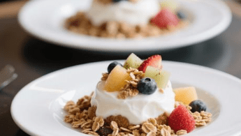 Greek yogurt parfait with granola and fruits